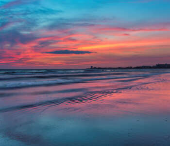 Pink Sunset at Siesta Key beach, Gulf Mexico, Florida. USA
